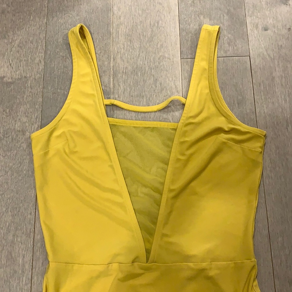 yellow bodysuit